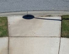 Properly edged grass along the border of a side walk.